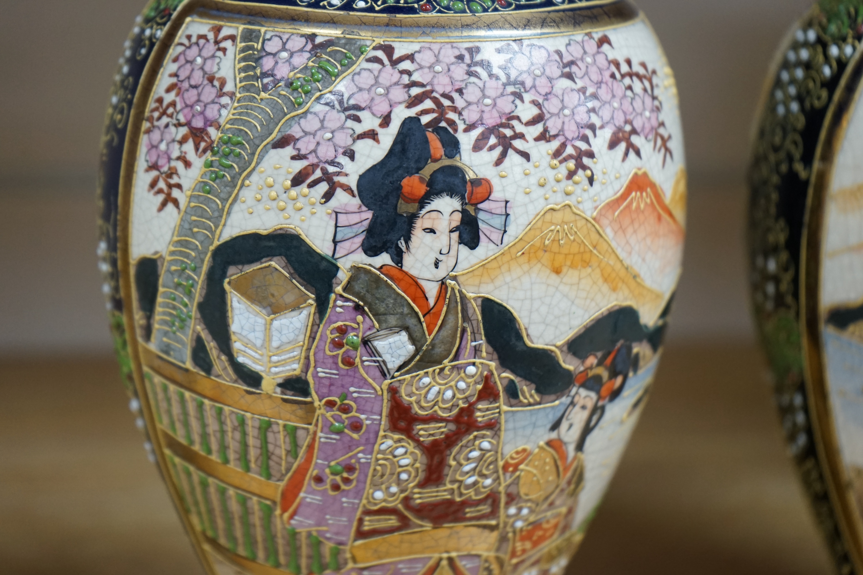 A pair of Japanese Satsuma vases, 22.5cm. Condition - good